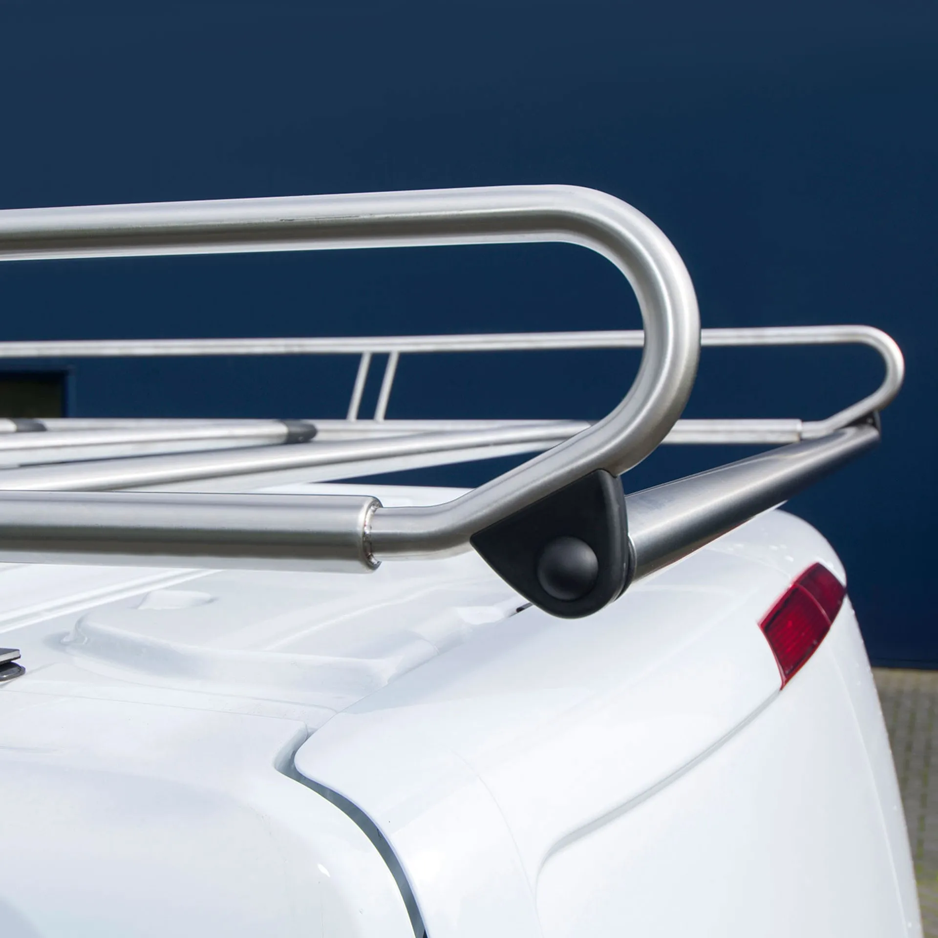 Auto Roof Carrier made of stainless steel, loading roller, high load capacity, low dead weight. Serie CVA Mounted Roof Cargo Carrier by AlphaDynamik